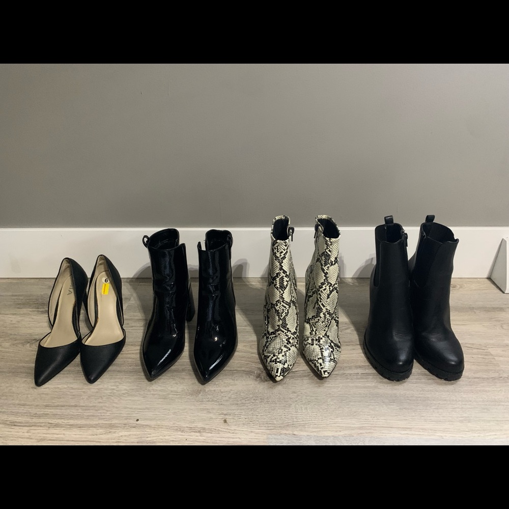Black pointed toe snake print heels